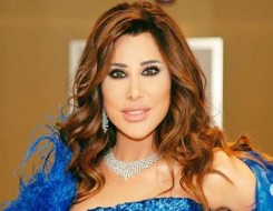 الدار البيضاء اليوم  - نجوى كرم تستعرض رشاقتها بفساتين أنيقة من التسعينات